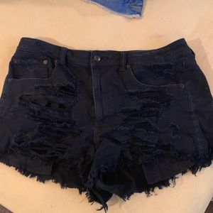 Black distressed shorts
